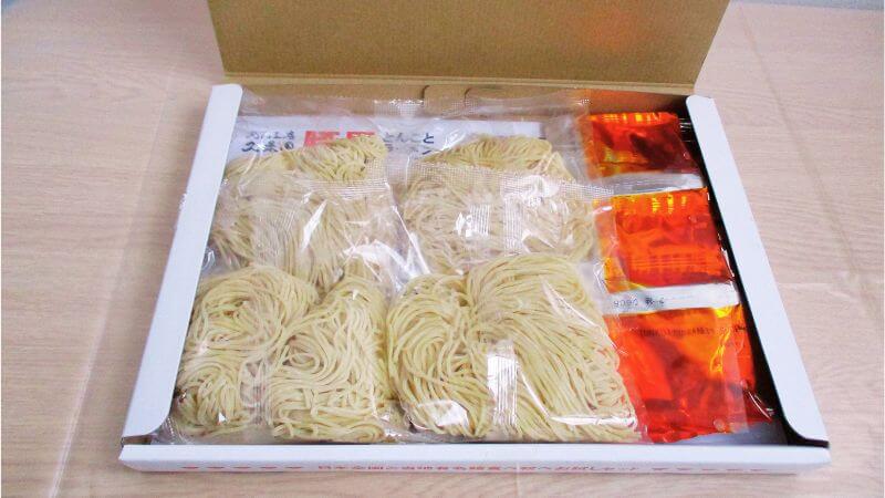 めん工房久保田ビーガンラーメン豚異（とんこと）のパッケージ